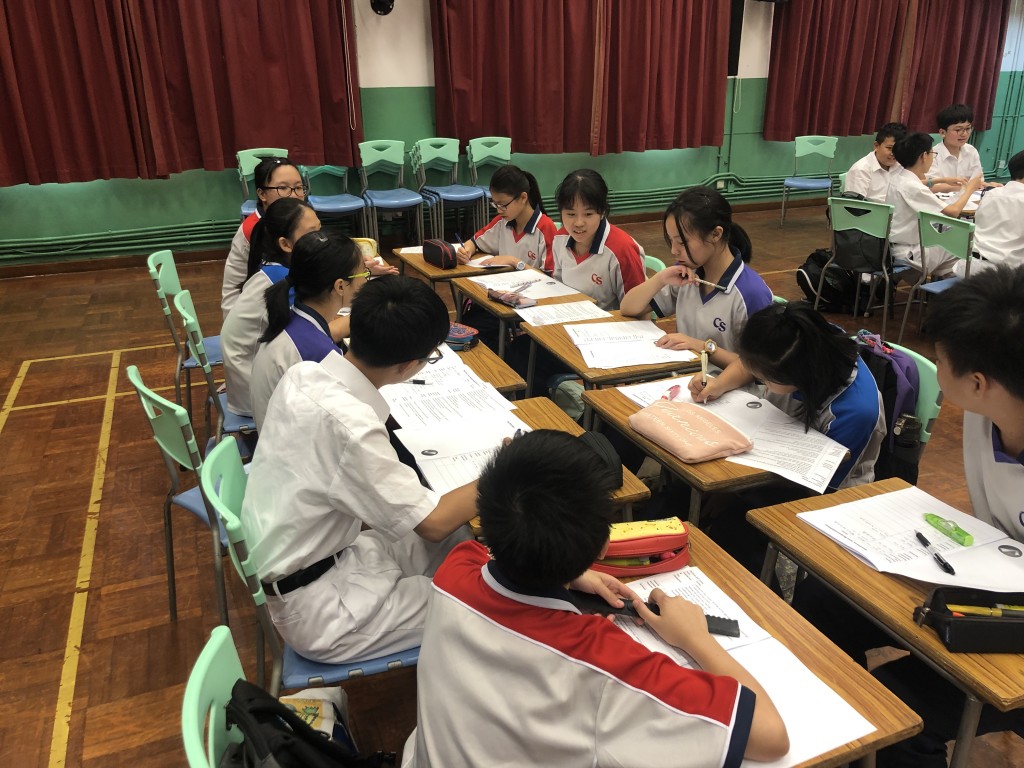 Students having a mock class association meeting