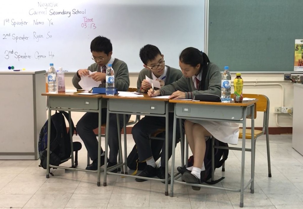 Nemo Yu, Ryan So and Grace Ho in the HKPTU Inter-school English Debate Competition